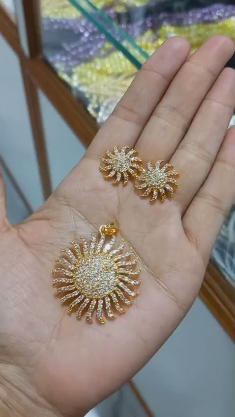 Beautiful  and premium gold plated Pendant with chain and matching studs
Code : SunG1S