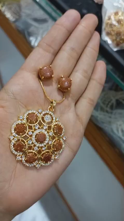 Beautiful Sand stone premium gold plated Pendant with plain chain necklace and matching ear studs
Code : SandPS1