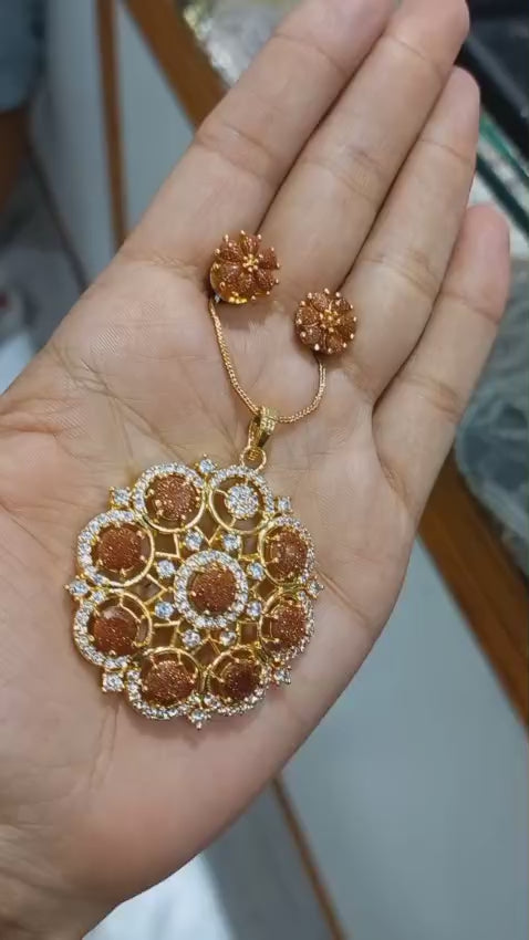 Beautiful Sand stone premium gold plated Pendant with plain chain necklace and matching ear studs
Code : SandPS1