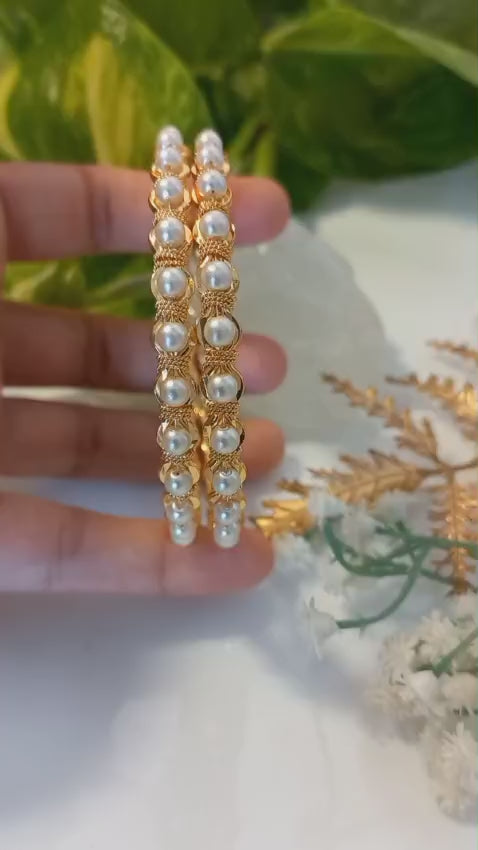 Beautiful gold plated premium Pearl Bangle Pair
Code : PearlP10