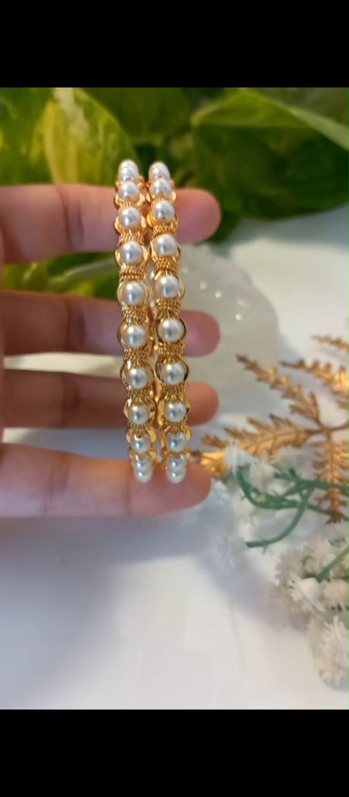 Beautiful gold plated premium Pearl Bangle Pair
Code : PearlP10 Jewel byjuwaan