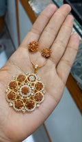 Beautiful Sand stone premium gold plated Pendant with plain chain necklace and matching ear studs
Code : PSBS1 Jewel byjuwaan