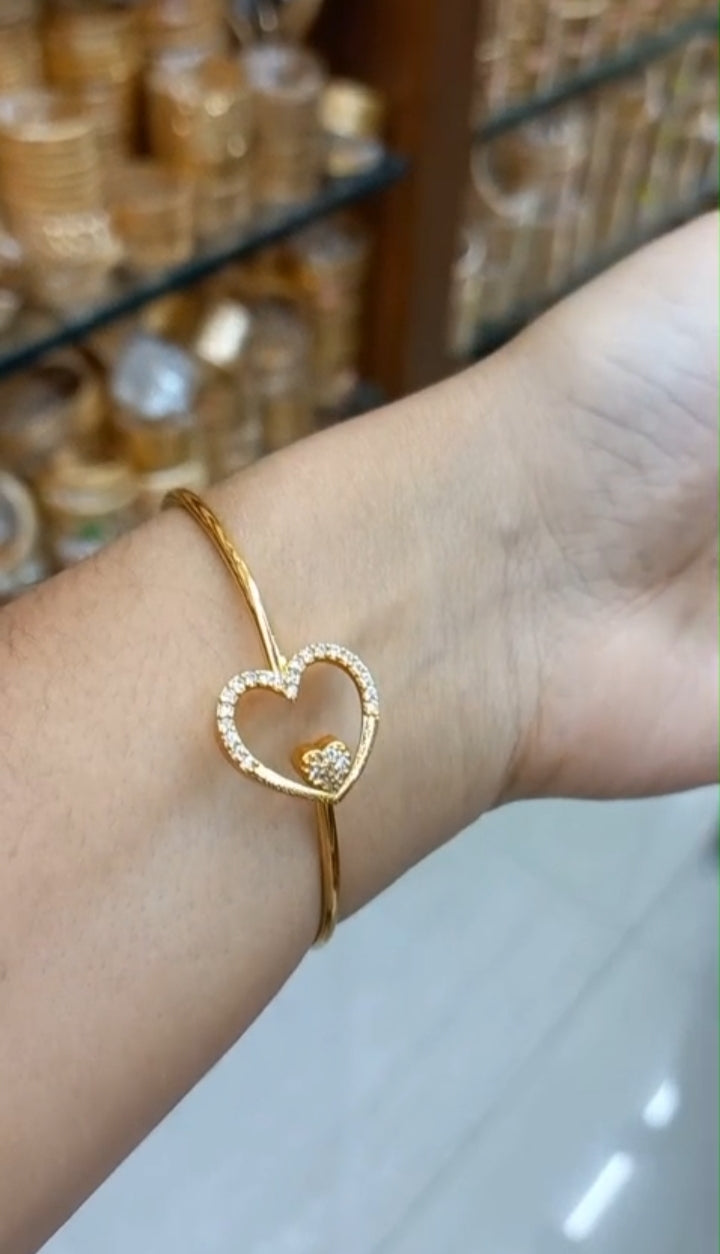 Daily wear premium gold plated AD bangle 

Code : BangleLVE Jewel byjuwaan
